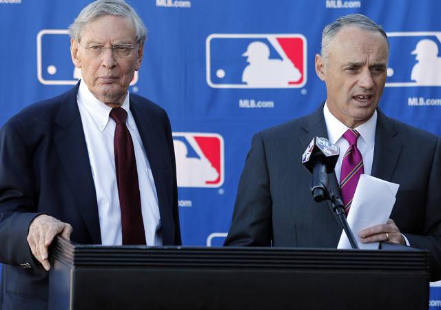 Rob Manfred (right) will take over the role of MLB commissioner from Bud Selig.